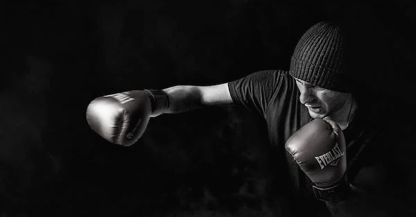 a man wearing boxing gloves