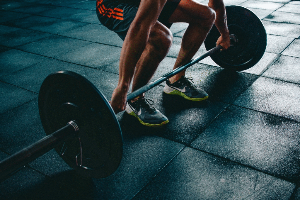 A person lifting a barbell