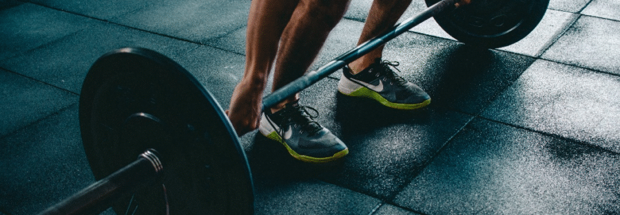 A person lifting a barbell