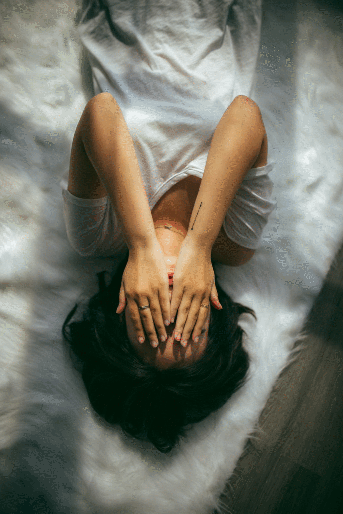 a woman lying in bed.